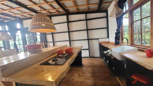 a kitchen with a counter and a sink in a room at DesertDewEstate in Nanyuki