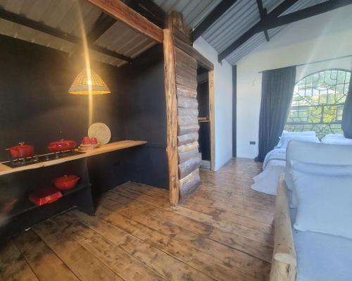 a room with a bed and a fireplace in it at DesertDewEstate in Nanyuki