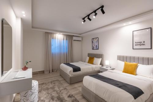 Ένα ή περισσότερα κρεβάτια σε δωμάτιο στο Cairo Homes Down Town El batal