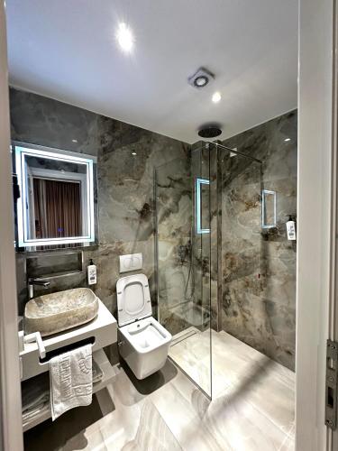Koupelna v ubytování Dedej Rooms