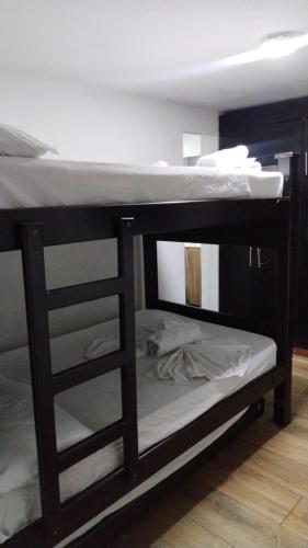 a couple of bunk beds in a room at Apartamentos Acogedores Laureles in Medellín