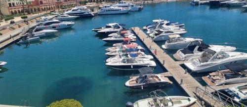 a bunch of boats docked in a harbor at Private Apartment One bed room at Talabay -Independent Listing in Aqaba