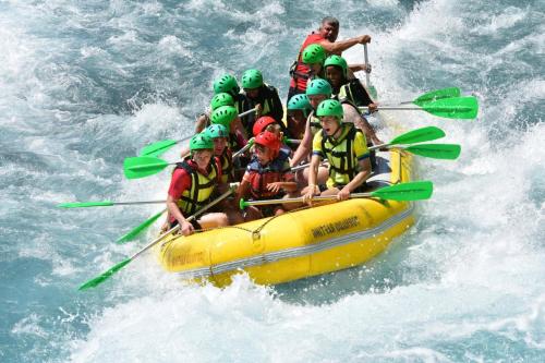 a group of people in a raft in the water at Beach Side Holiday in Omiš