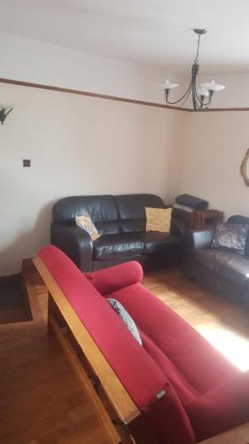 Χώρος καθιστικού στο Relax at the Cosy Snug Glossop