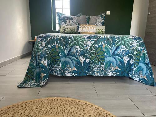 Una cama o camas en una habitación de Villa MYA Location