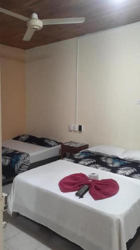 Nuevo Hotel Sandy Chicoralにあるベッド