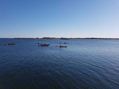 a group of boats on a large body of water at 8 person holiday home in Hals-By Traum in Hals