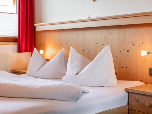 Ένα ή περισσότερα κρεβάτια σε δωμάτιο στο Landhaus Marchfeld Top 4