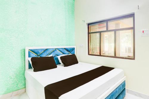 Postel nebo postele na pokoji v ubytování Hotel Ranjana Diamond