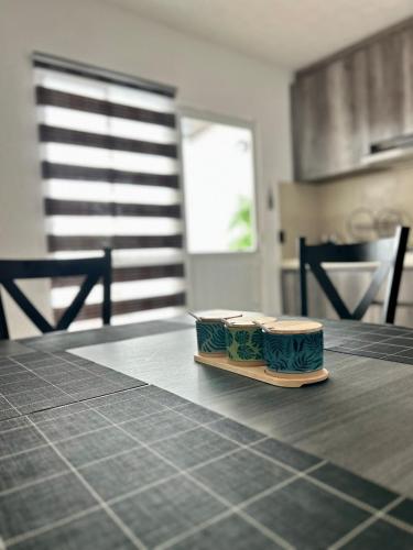 a plate of food on a counter in a kitchen at Sumergete Nueva Residencia en Playa del Carmen in Playa del Carmen