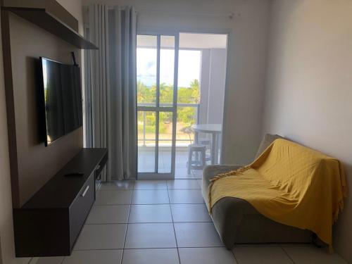 Μια τηλεόραση ή/και κέντρο ψυχαγωγίας στο Blue Park Residence Ilhéus - Ba