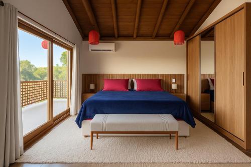 Una cama o camas en una habitación de Casa Ettore Mollo - Trancoso