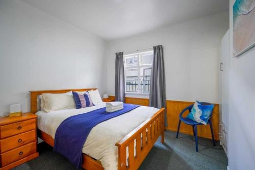 Katil atau katil-katil dalam bilik di Classic 3-Bedroom Home in Whangarei