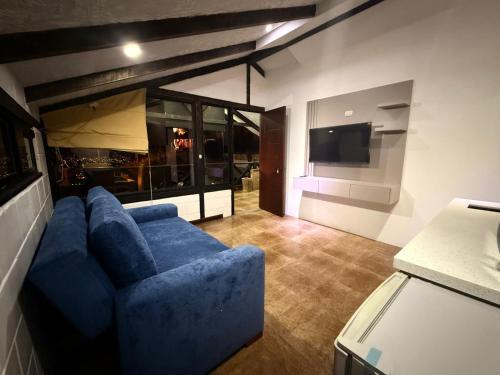 TV a/nebo společenská místnost v ubytování Azotea Suites & Apartments