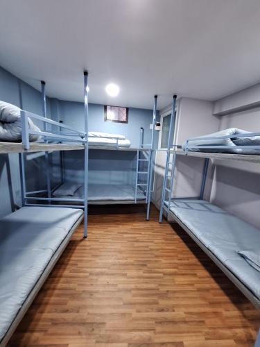 Llit o llits en una habitació de KTM Homestay
