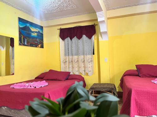 Postel nebo postele na pokoji v ubytování Hospedaje González