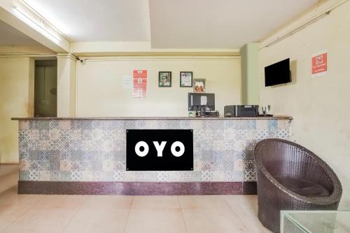 a counter with an ovy sign on it in a room at FabHotel Arambol Inn in Arambol