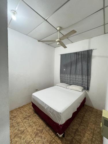 Una cama o camas en una habitación de Guest House Veracruz