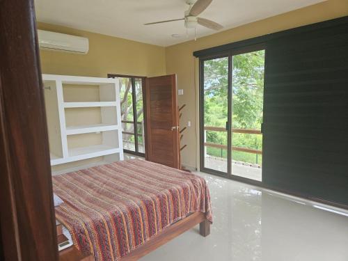 Ένα ή περισσότερα κρεβάτια σε δωμάτιο στο Surf lodge