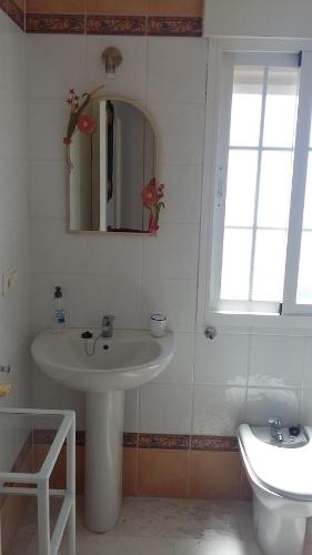 Ένα μπάνιο στο Apartamento Malak