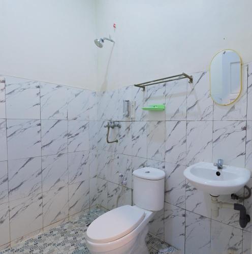 Ванная комната в Grand Soe Hotel