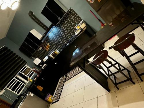 Μια τηλεόραση ή/και κέντρο ψυχαγωγίας στο Nabella Homestay Perlis