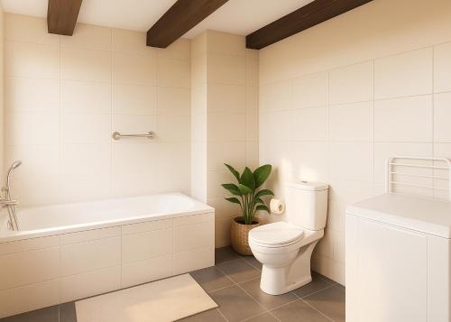 a bathroom with a toilet and a bath tub and a plant at Les remparts in Ensisheim