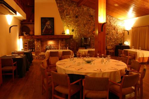 
a large dining room with tables and chairs at Berga Resort in Berga
