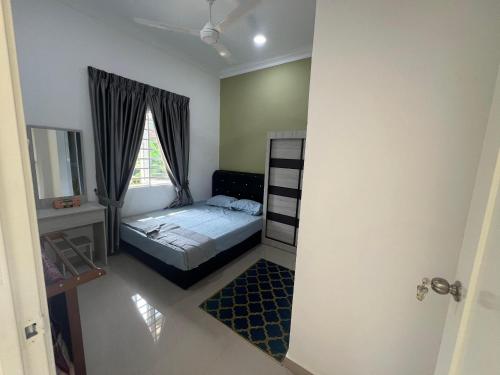 Кровать или кровати в номере KZ homestay