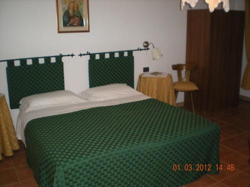 Ένα ή περισσότερα κρεβάτια σε δωμάτιο στο Bike-Hotel Abete