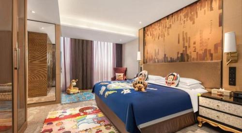 Postel nebo postele na pokoji v ubytování Shijiazhuang Ximeijin Continental Hotel