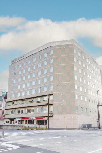 a large building with a lot of windows at Sotetsu Fresa Inn Yokohama Totsuka - Renovated in March 31st 2025 in Yokohama