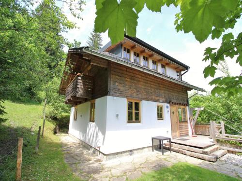 a small house in the middle of a field at Chalet with Views, Privacy & Fire in Kaprun in Kaprun