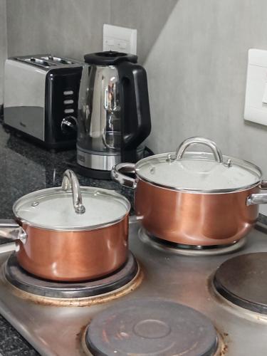 Dapur atau dapur kecil di Mayaza Luxury Apartment