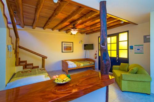 Postel nebo postele na pokoji v ubytování Galapagos Cottages