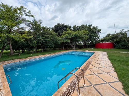 Πισίνα στο ή κοντά στο BluePebble Villa Private Pool Retreat by Homeyhuts