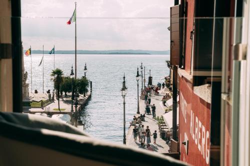 a view of a body of water from a building at Borgo di Lazise in Lazise