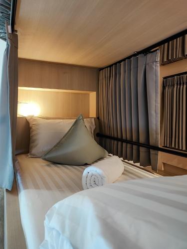 Postel nebo postele na pokoji v ubytování YAA Hostel