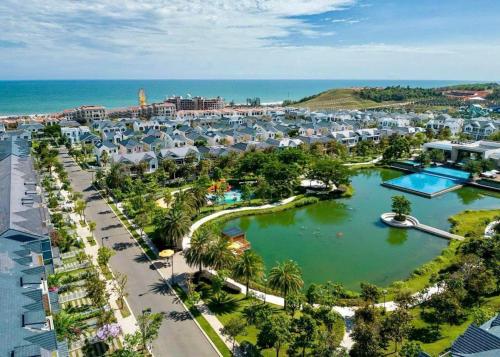 an aerial view of a resort near the ocean at Villa 4BR NovaWorld Phan Thiết for 6-8 pax 09 in Bình Tú