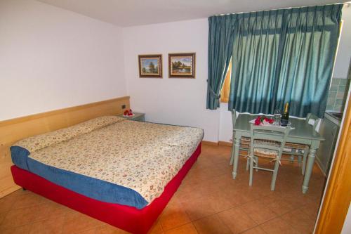 Кровать или кровати в номере Agriturismo Raethia