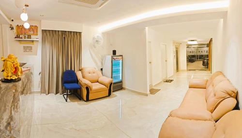 Un lugar para sentarse en Starlight Hotels T-Nagar