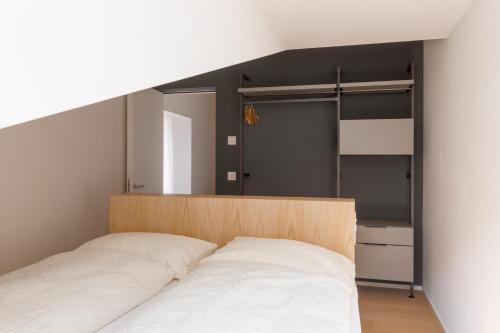 Ένα ή περισσότερα κρεβάτια σε δωμάτιο στο Albergo Croce Bianca