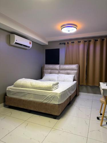 a bedroom with a bed in a room at Arte Cheras in Kuala Lumpur