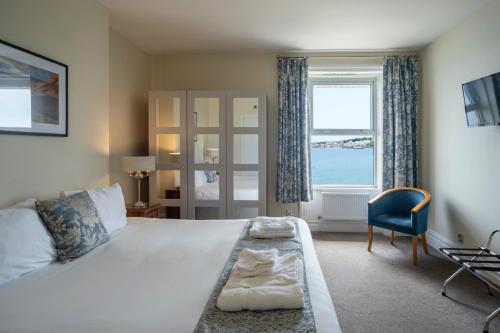 Ένα ή περισσότερα κρεβάτια σε δωμάτιο στο Grand Hotel Swanage