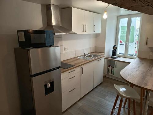 Η κουζίνα ή μικρή κουζίνα στο Maison 2-4 pers avec parking proche Parc