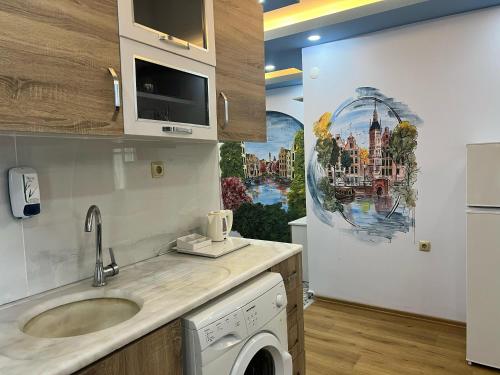 Η κουζίνα ή μικρή κουζίνα στο Esma Apart Otel