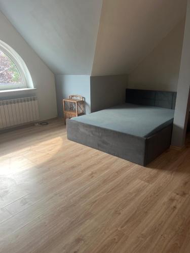 Ένα ή περισσότερα κρεβάτια σε δωμάτιο στο Guesthouse