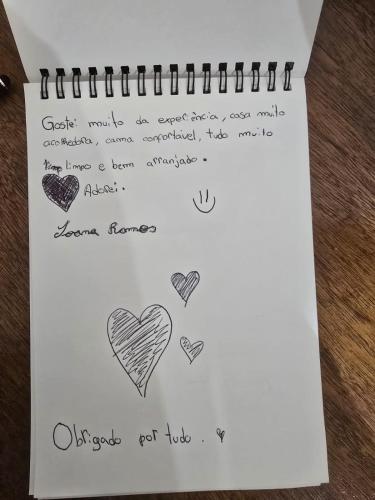 a note with a drawing of hearts on it at Casa Pito in Santo António do Baldio