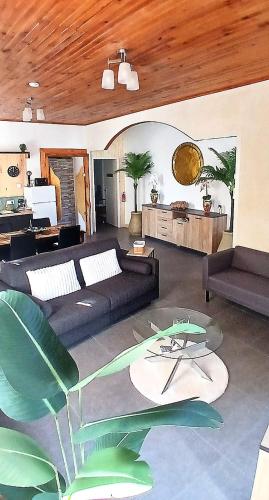 Ruang duduk di Le Loft - Appartement en RDC - 1chambre