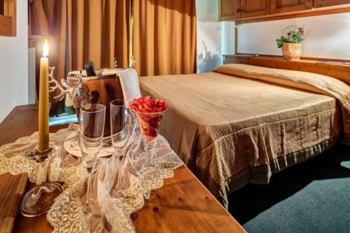 Katil atau katil-katil dalam bilik di Suite Hotel Cristallino - Natale